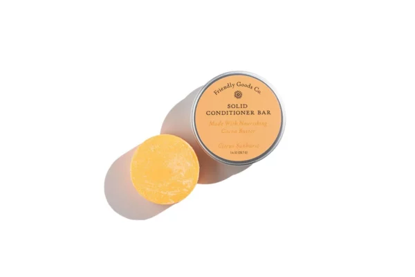 Friendly Goods Citrus Sunburst Conditioner Bar with aluminum tin on a white background